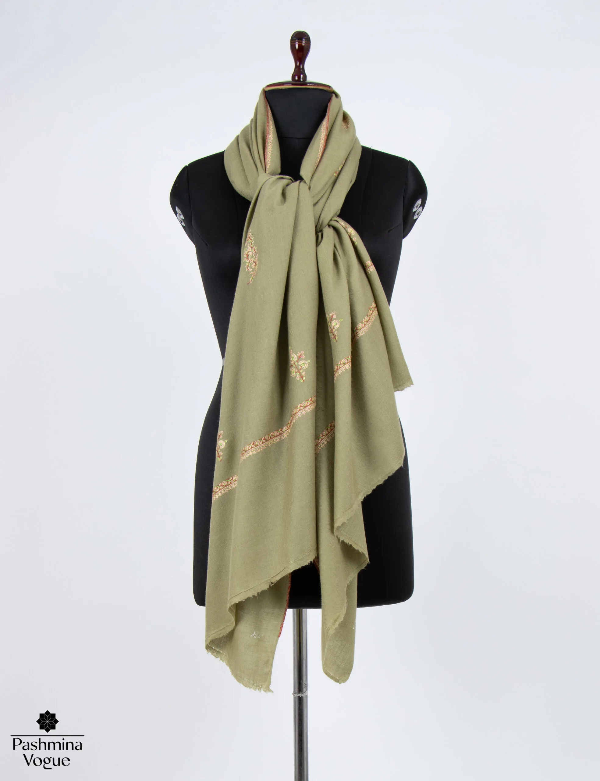 Model wearing a beige shawl