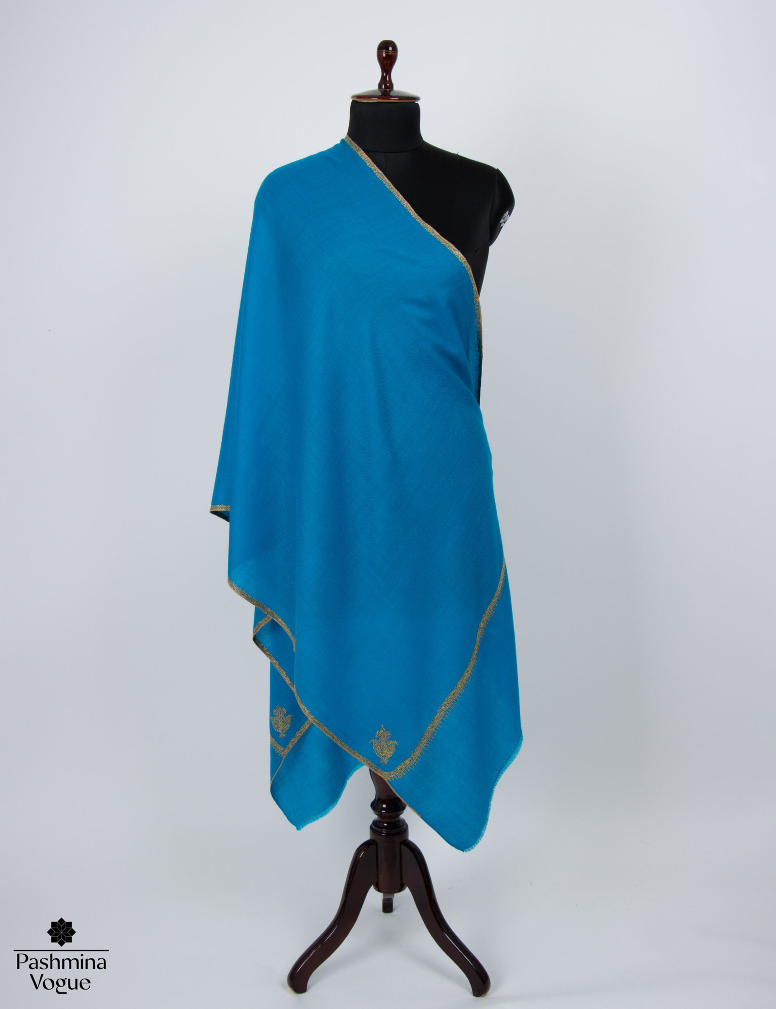 A draped 100% pure cashmere wool scarf for women, highlighting its soft texture and natural drape.