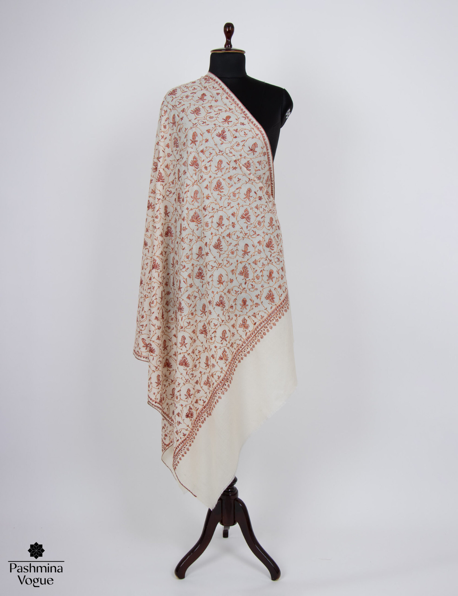 white pure wool scarf, highlighting its handwoven quality and soft, lightweight texture