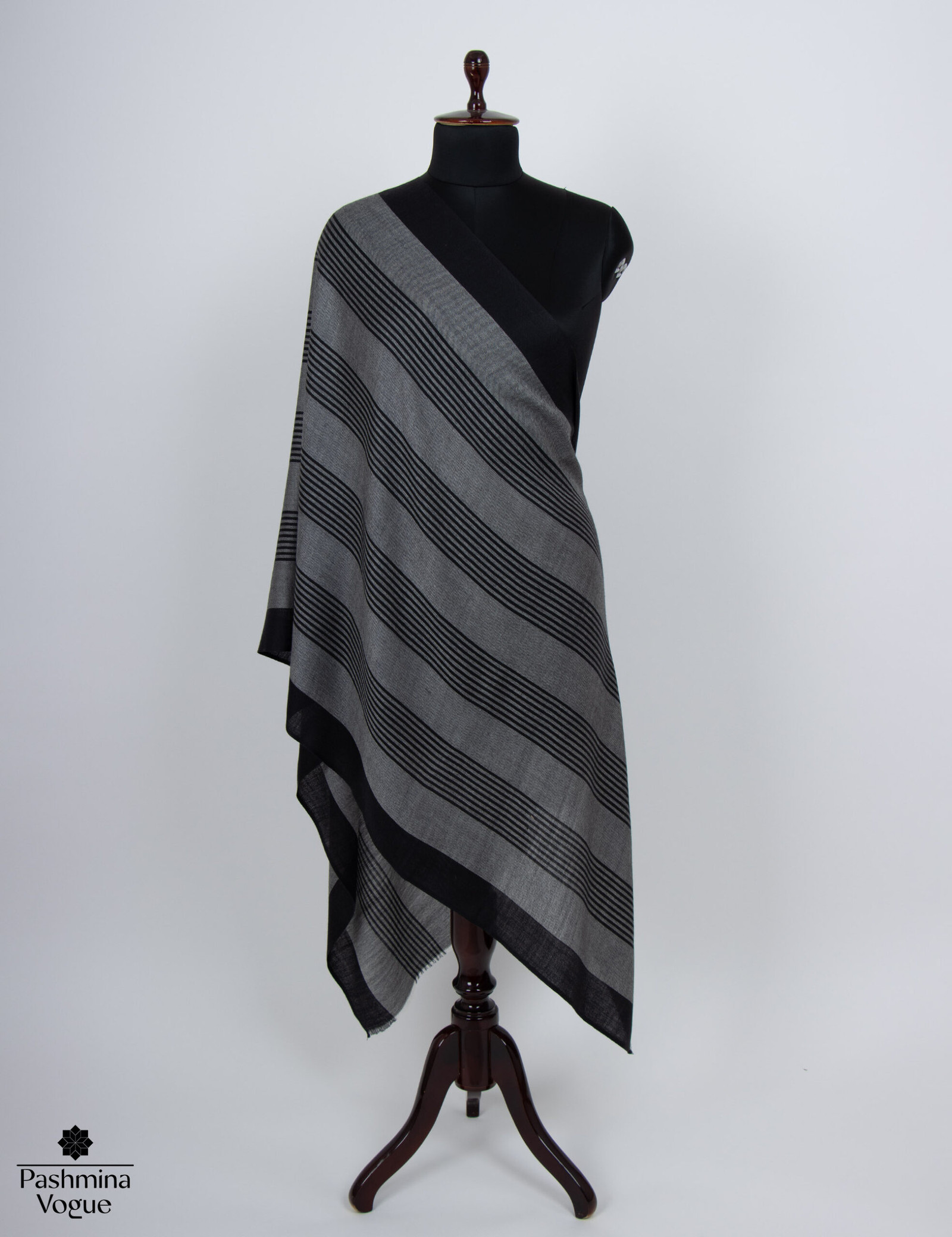 soft Merino wool shawl with classic black and grey stripes, highlighting its cozy texture and elegant style, ideal for a wedding.