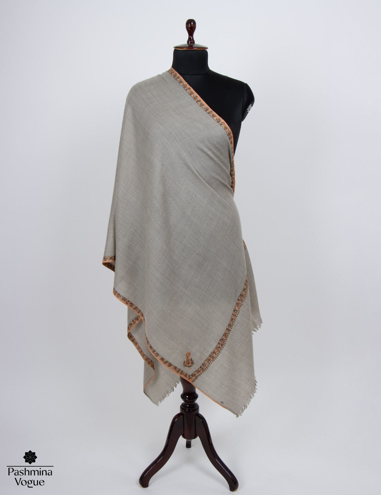 lightweight wool scarf with intricate Sozni hand embroidery, highlighting the fine needlework and soft texture.