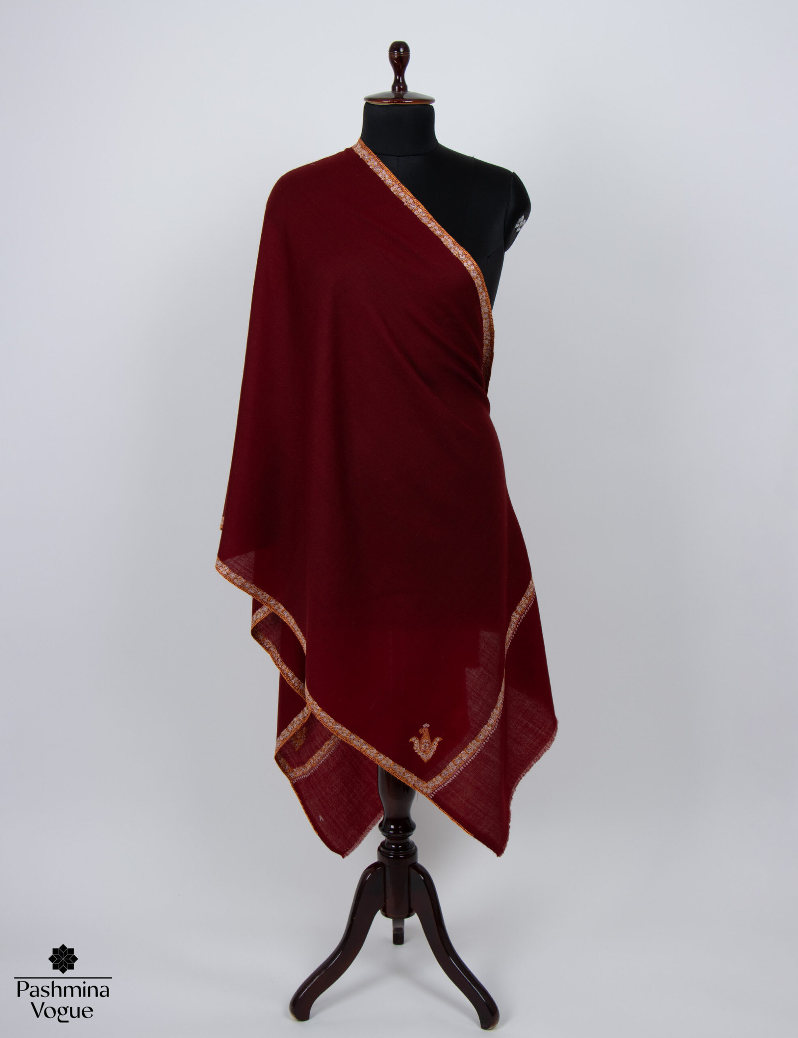 soft cashmere and Merino wool blend scarf in a deep burgundy color, highlighting its luxurious texture and warmth.