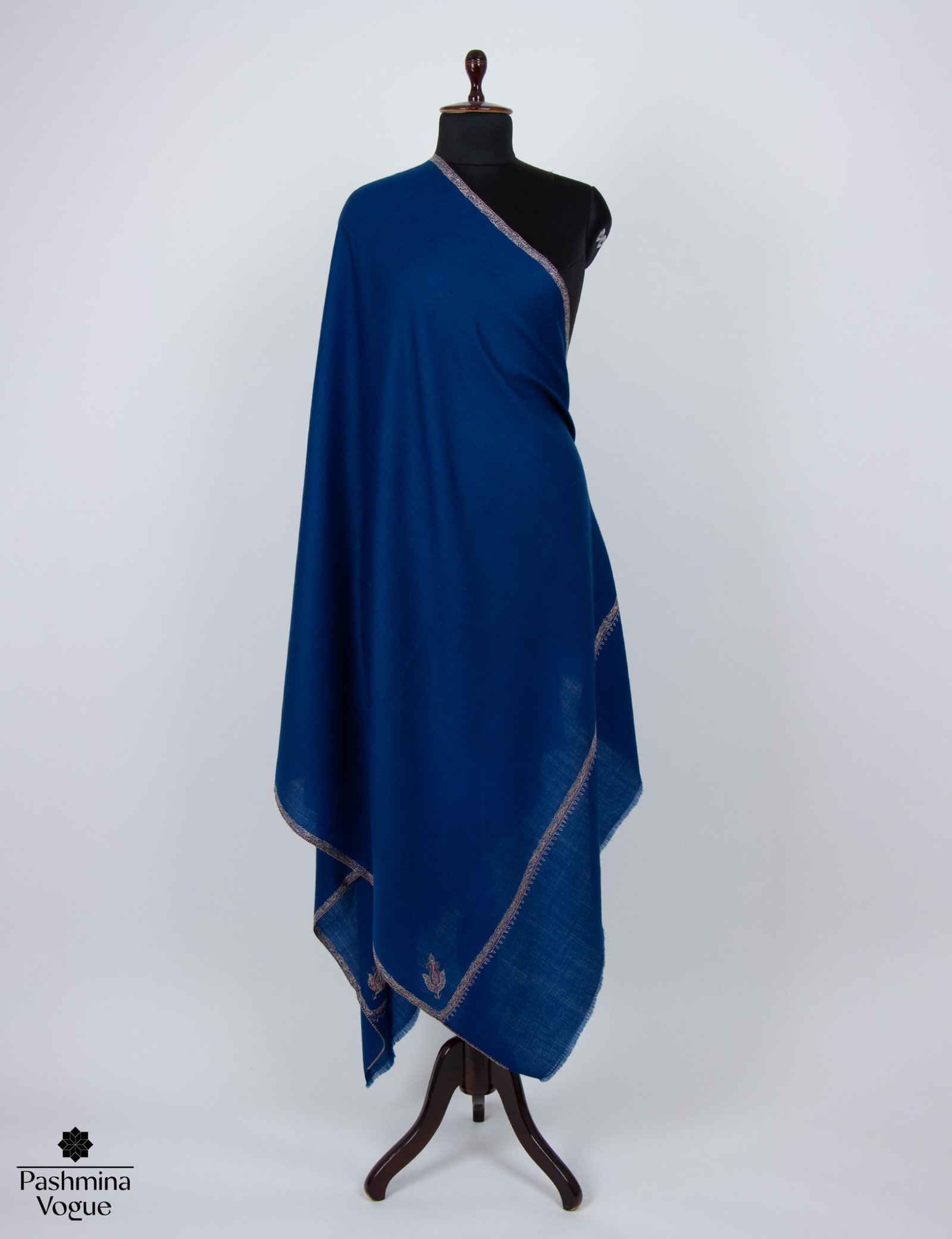 blue Merino wool shawl with fine Kashmiri hand embroidery, highlighting its soft texture and intricate detail.
