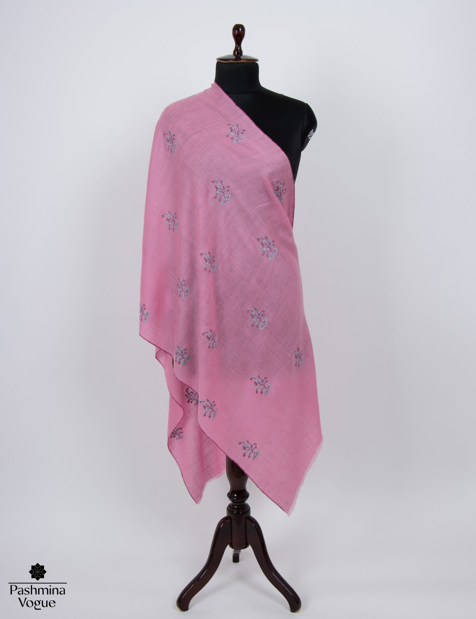 soft pink pure pashmina shawl with fine hand embroidery, highlighting the luxurious cashmere texture and delicate pattern.