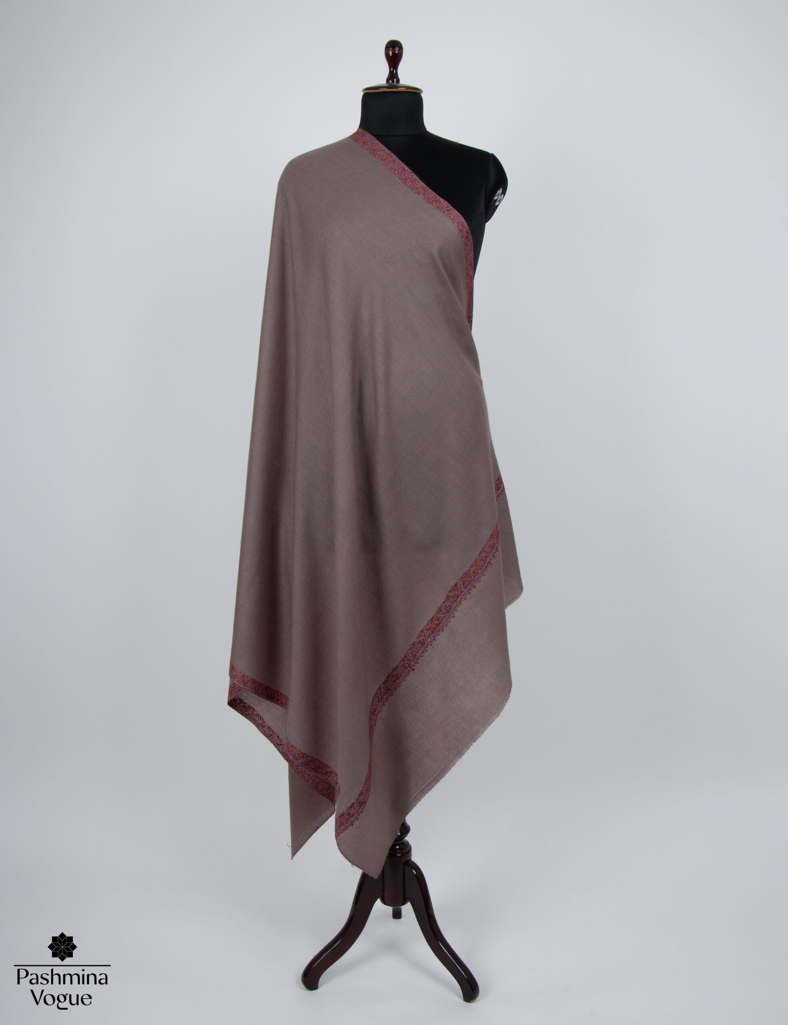 soft Merino wool shawl featuring elegant Kashmiri hand embroidery, highlighting the cozy texture and intricate artisanal detailing.