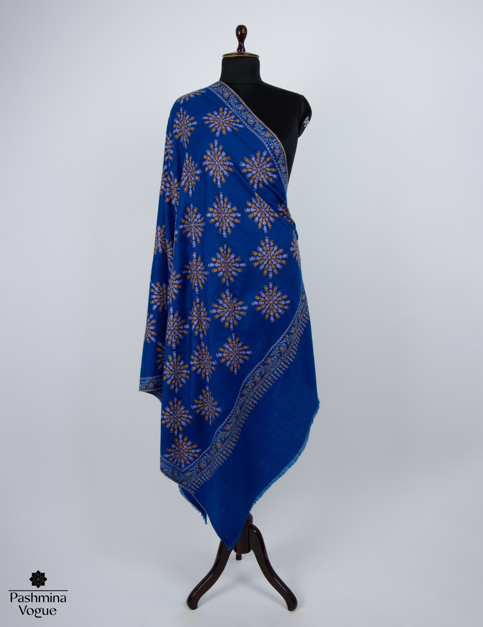 blue pashmina scarf with delicate Kashmiri Sozni hand embroidery, highlighting its soft cashmere texture and intricate detail.