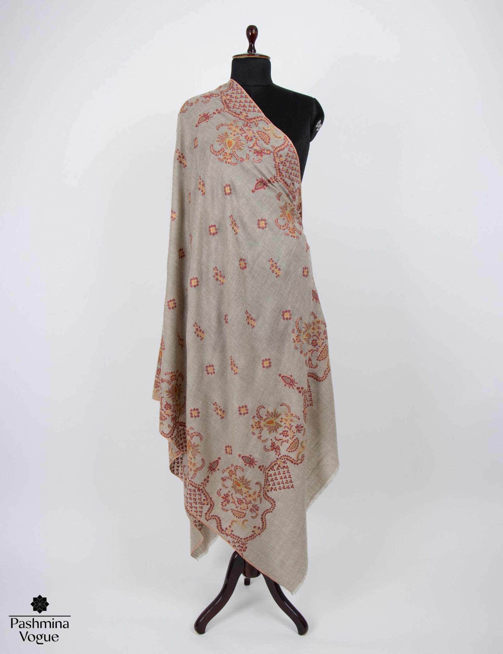 hand-embroidered Kashmiri pashmina shawl featuring intricate Sozni needlework on a soft, handwoven cashmere base.