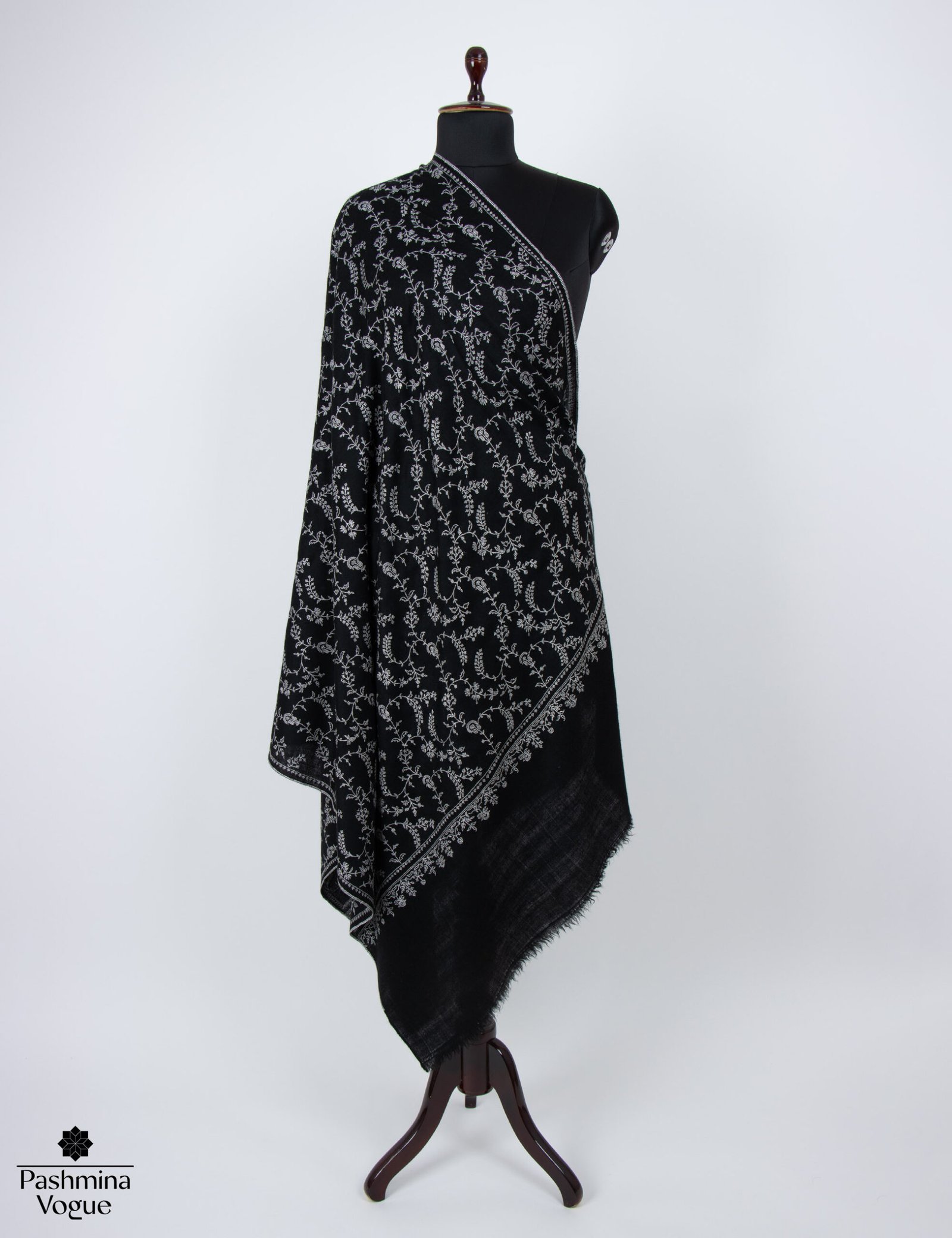 classic black pure pashmina scarf, highlighting its handwoven cashmere texture and soft, elegant drape.