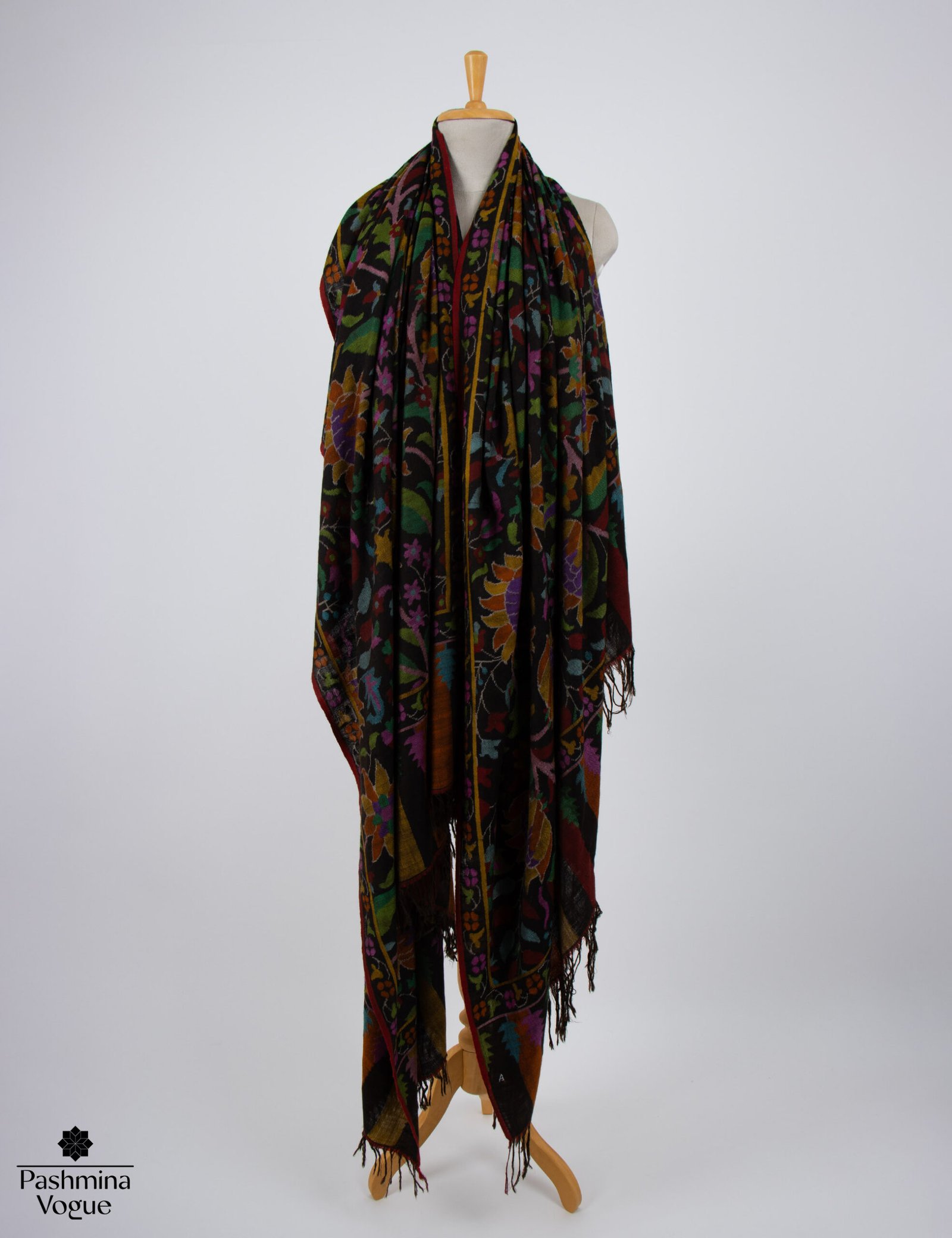 Deep jet black pure Pashmina shawl featuring royal traditional handwoven multicolor Kani motifs by Pashmina Vogue.