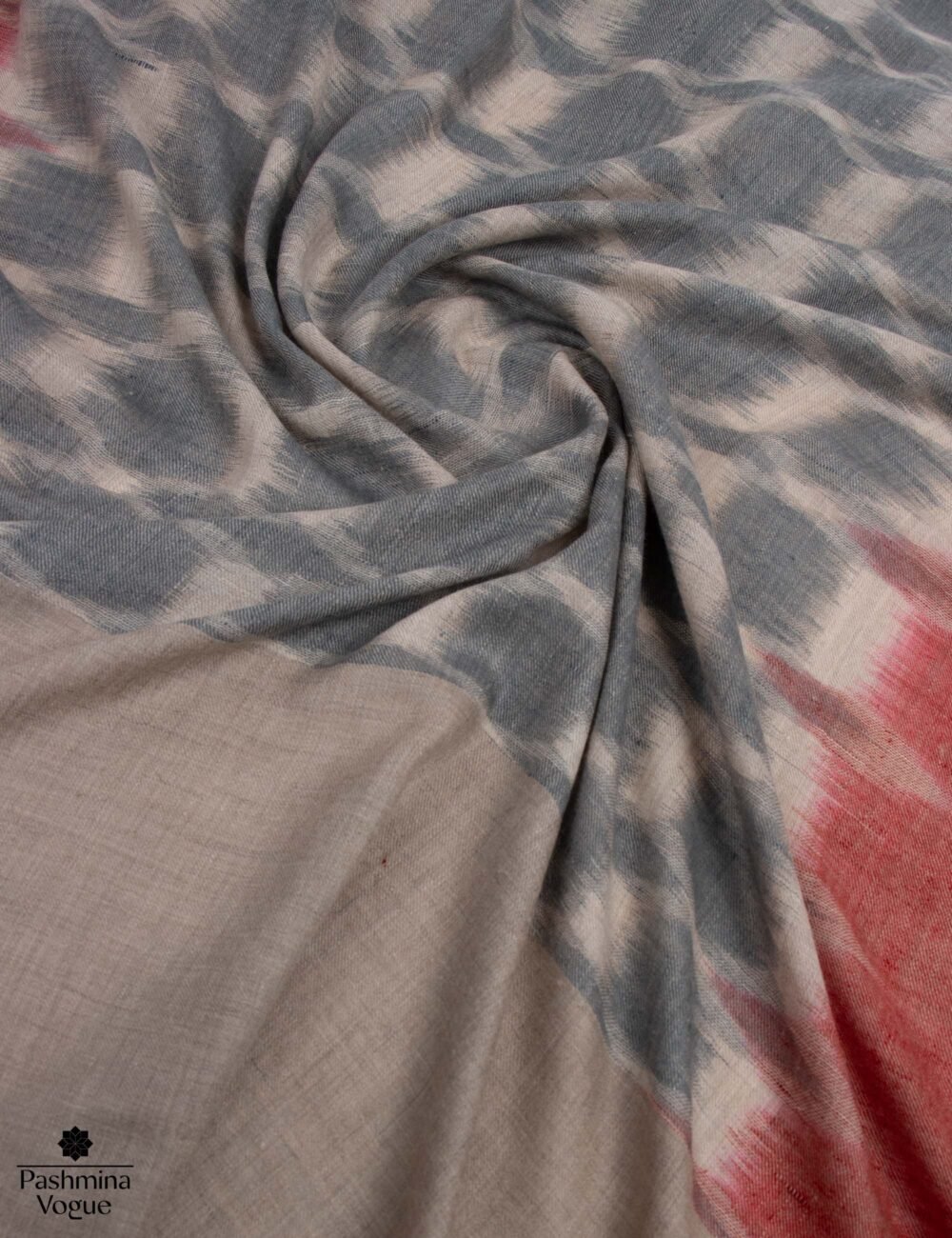 100% pure Pashmina shawl styled as a luxury handwoven Kashmir scarf in a classic solid color.