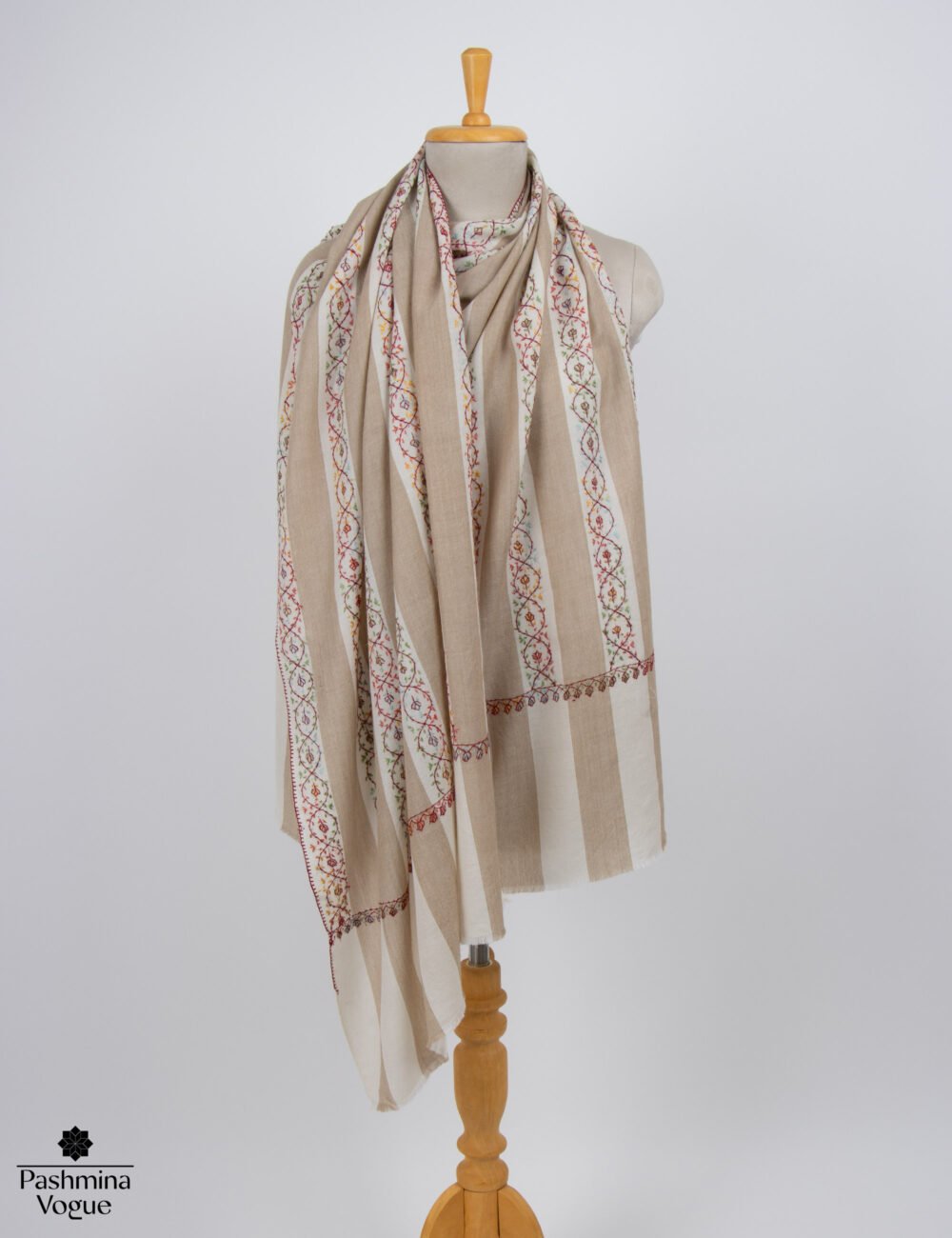 Hand-embroidered wool scarf displayed as an authentic Kashmiri Sozni shawl and lightweight luxury winter wrap