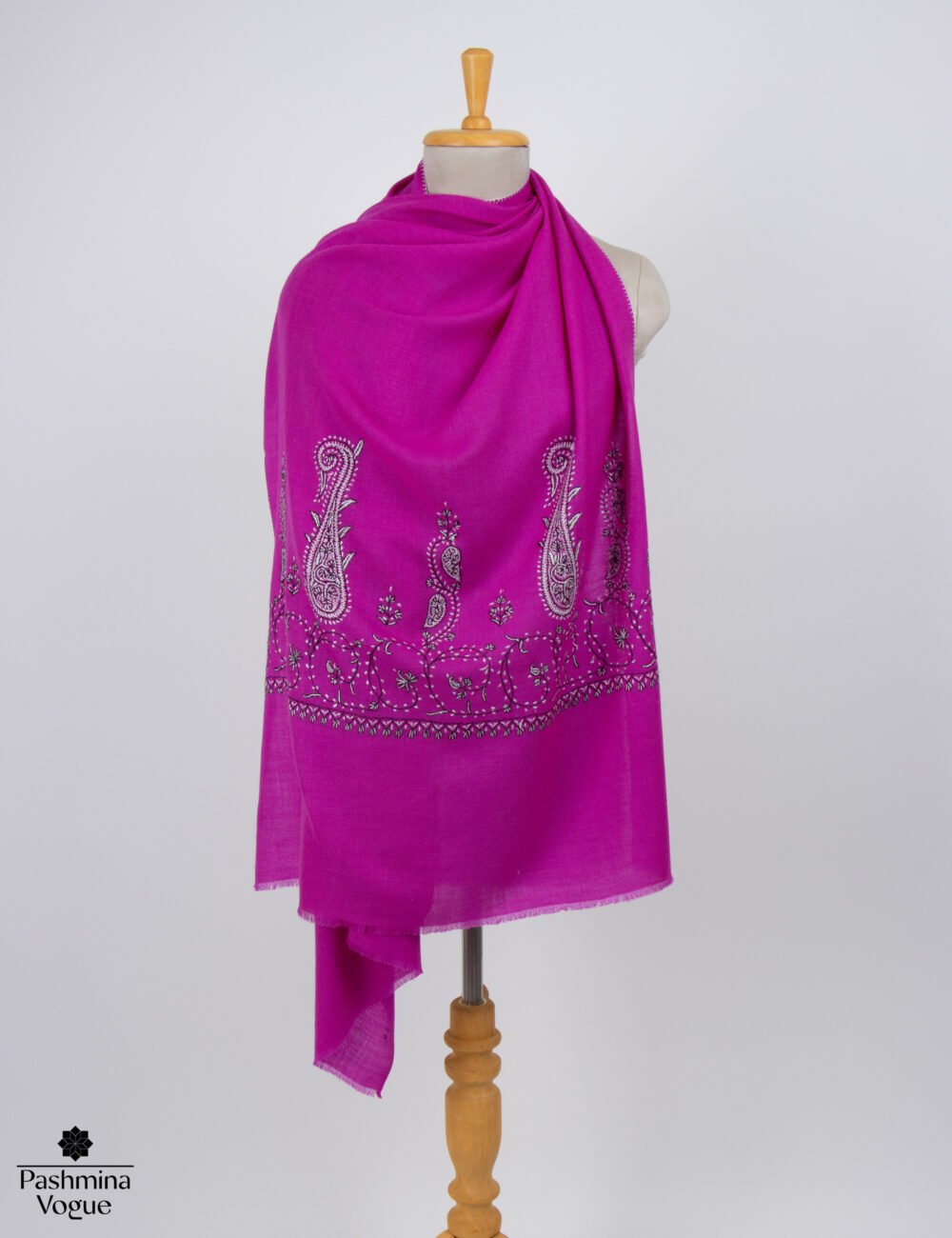 Pink Merino wool Palladar stole displayed as a soft lightweight winter scarf and hand-woven Kashmiri shawl by Pashmina Vogue.