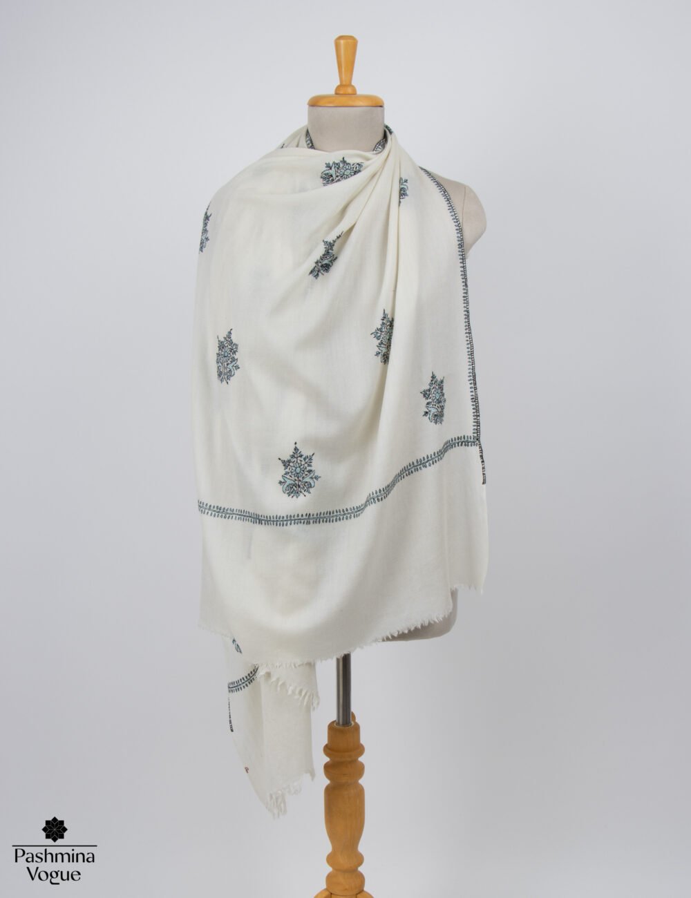White Bootidar Pashmina shawl with fine hand embroidered Sozni Kashmiri motifs, styled as a lightweight fine wool wrap and luxury gift for her by Pashmina Vogue.